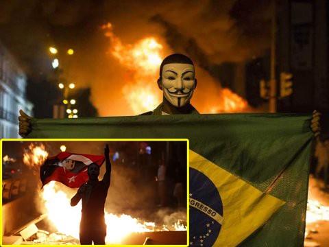 Göstericiler yakıp yıktıkları yerlerde bayraklarla poz vererek Milli bir hava oluşturmaya çalıştı.