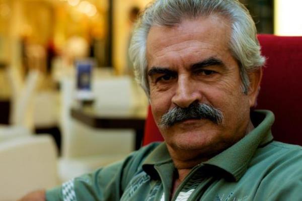 İzzet (Erol Tezeren)