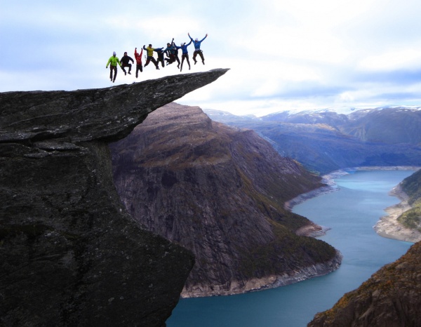 6) Jumping on the Trolltunga rock in Norway.