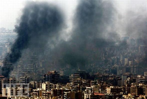 Orijinal resmi eken Lbnanl gazeteci Adnan Hacc&#8217;n, saldrnn yol at ykm abartmak amacyla resim zerinde oynadn kabul etti.