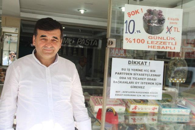 Yeil Caddesi'nin 31 yllk esnaflarndan Yksel Cihan, dkkanna ast yaz ile dikkatleri zerine toplad.