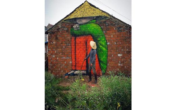 Byk duvar resimlerinde sk sk onu ettii ocuklarla ypranm duvarlar renklerle dolduruyor. Malland yerel sanatlarla birlikte almaya da her zaman yatkn.