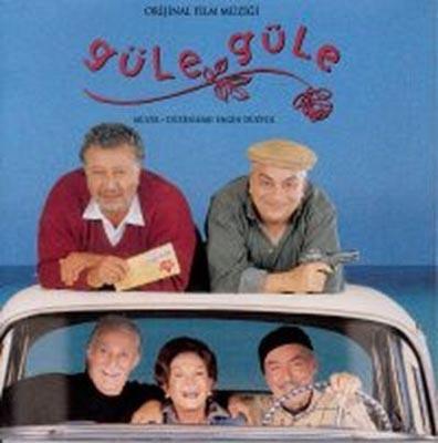 GLE GLE-  HAVAALANINA GDERKEN ZEK ALASYA LE METN AKPINAR KONUUYOR. ZEK ALASYA, ARABANIN NNDE OTURUYOR VE FLORYA SAHL YOLU'NDA. METN AKPINAR, ARKA KOLTUKTA VE BAKA BR YERDE.