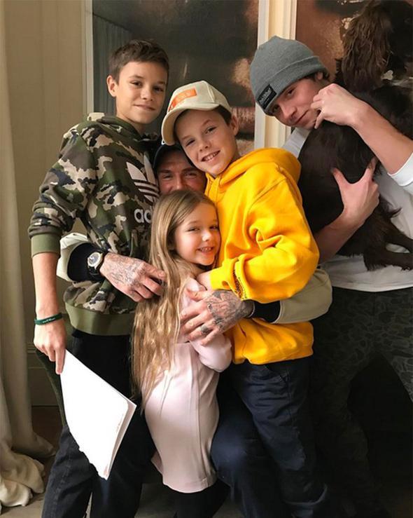 Victoria Beckham'n paylamyla ei David ve ocuklar.