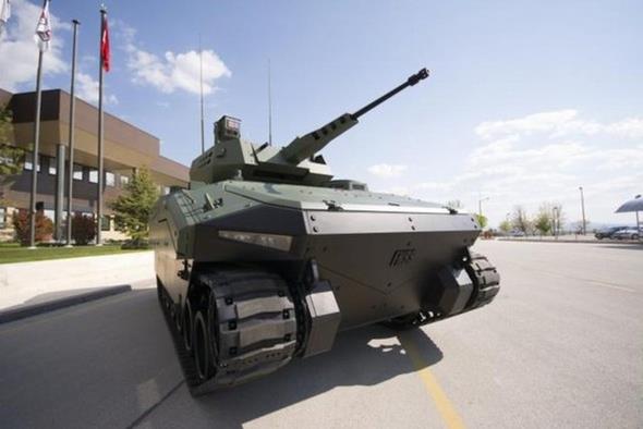 KAPLAN, balistik malzemelerden, balistik kaynak teknii ile birletirilerek imal edilir. Gvde; su szdrmaz olup, kapaklar ve tapalar su szdrmaz contaldr. G grubu kabini ile geniletilmi src blmesi aracn n ksmnda yer alrken; nianc ve komutan mahalleri aracn orta ksmda bulunur.