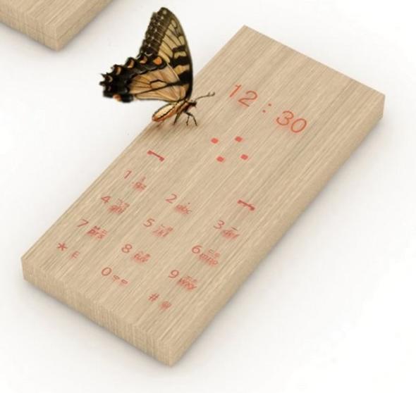 Maple Phone  <br>  Grnte sadece 4.5 x 10.4 x 9.8 cm ebatlarnda ahap bir para...