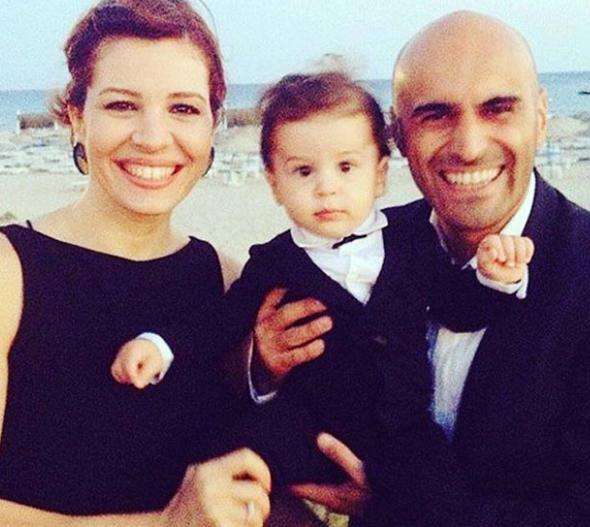 Alper Kul ve Aylin Kontande oullaryla birlikte.