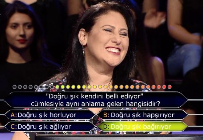 kinci soruya da doru yant veren zkan'n mutluluu gzlerinden okunuyordu.