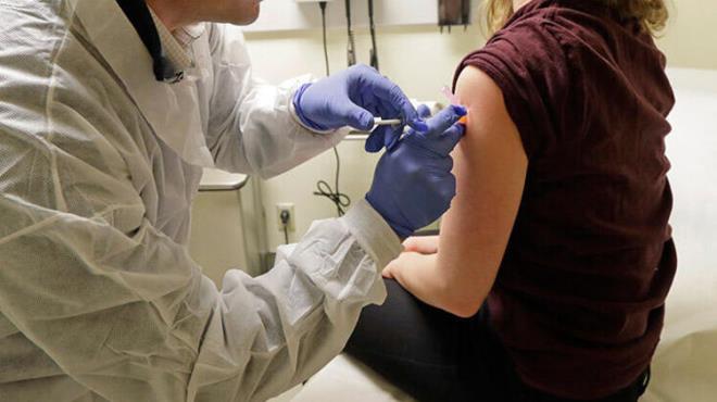 kinci dozda gnlllerin yzde 9.7'sinde yorgunluk, yzde 8.9'unda kas ars, yzde 5.2'sinde eklem, yzde 4.5'inde ise ba ars grld.