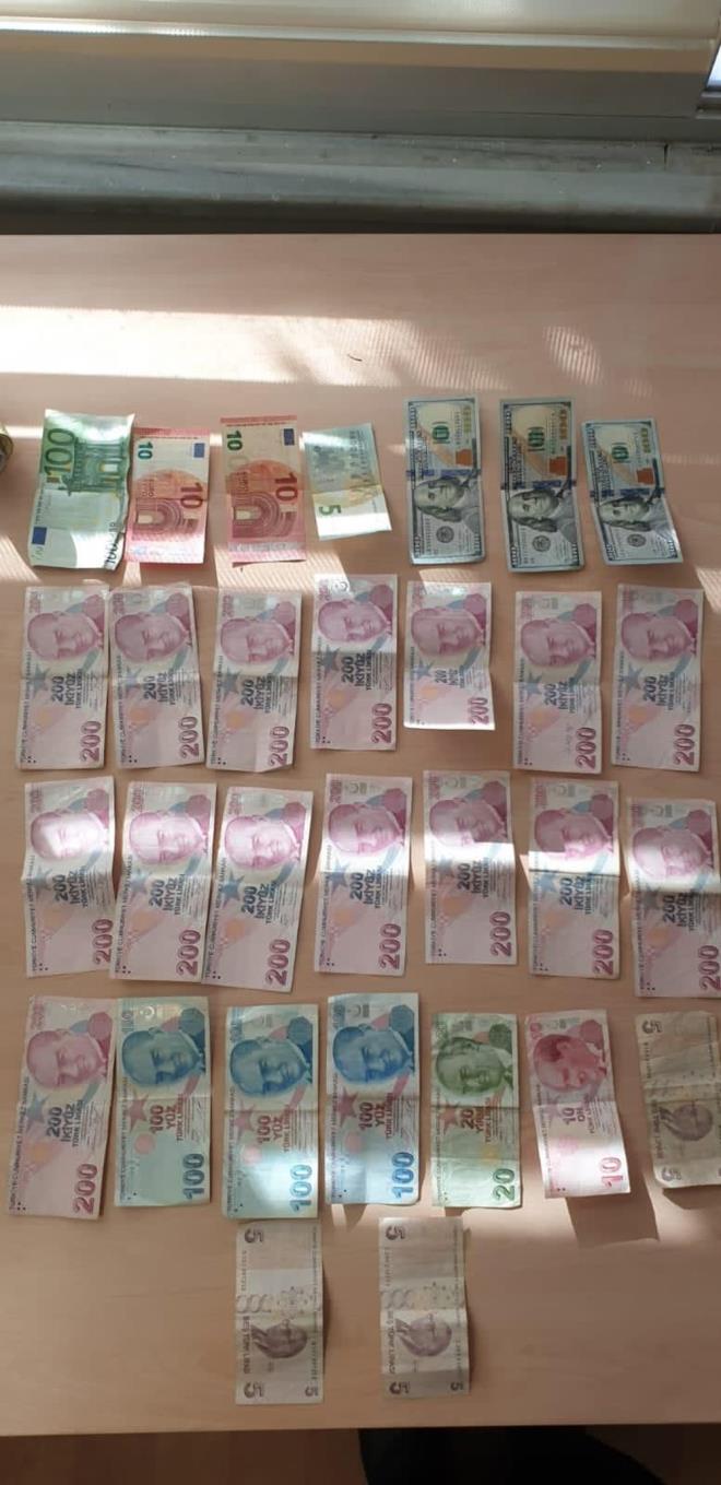 Kabahatler Kanunu'na gre hakknda yasal ilem yaplan .Y'nin zerinden kan paralar muhafaza altna alnd.