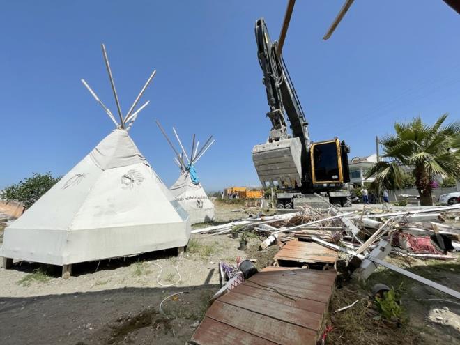 Mula'nn Fethiye ilesinde imara aykr olduu belirlenen yaplarn ykmlarna baland.