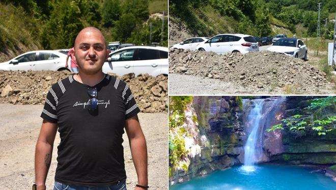 Erfelek ilesinde yaayan Ferdi Poyraz Aslan, kendi arazisinden geirildiini iddia edip 'Erfelek Tatlca elaleleri'ne giden yolu kepeyle toprak dktrp ara ulamna kapatt.