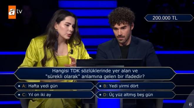 B�y�k �d�le iki ad�m kala soruya yar��madan �ekilme karar� alan ikili, 100.000 TL ile yar��maya veda etti.