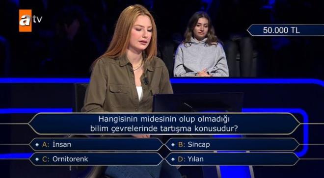 50.000 TL deerindeki soruya ulamay baaran yarmac "Hangisinin midesinin olup olmad bilim evrelerinde tartma konusudur?" sorusu karsnda byk bir aknlk yaad.