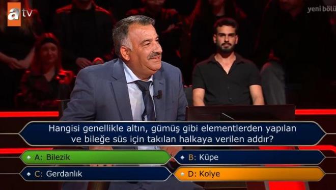 ahin'in karsna  "Hangisi genellikle altn, gm gibi elementlerden yaplan ve bilee ss iin taklan halkaya verilen addr?" sorusu kt.
