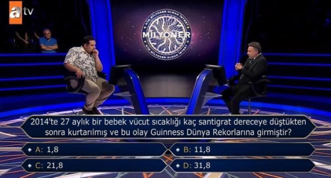 500 Bin TL deerindeki soruyu atran yarmacnn karna "2014'te 27 aylk bir bebek vcut scakl ka santigrat dereceye dtkten sonra kurtarlm ve bu olay Guiness Dnya Rekorlar'na girmitir?" sorusu kt.