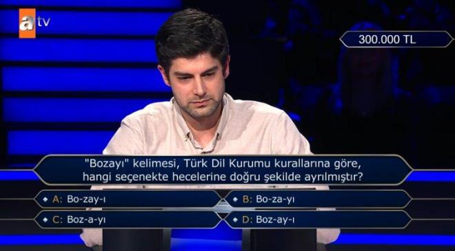 T�RK D�L KURUMU SORUSU �IKTI<br><strong>Yar��mac�n�n ter d�kmesine sebep olan soru ise ��yleydi: <span style="color:#800080"><em>"Bozay� kelimesi T�rk Dil Kurumu kurallar�na g�re, hangi se�enekte hecelerine do�ru �ekilde ayr�lm��t�r?"</em></span></strong>