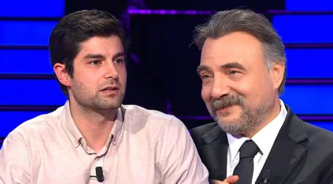 <span><em><strong>ATV ekranlar�n�n fenomen bilgi yar��mas� Kim Milyoner Olmak �ster, bu hafta da seyirciyi ekrana kilitlemeyi ba�ard�. Ge�ti�imiz ak�am yar��maya kat�lan Doruk S�zen isimli yar��mac�, 500 bin TL'lik soruya ad�m kala soruya verdi�i yan�tla geceye damgas�n� vurdu.</strong></em></span>