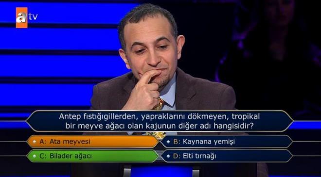 <strong>�nl� sunucu Oktay Kaynarca'n�n tahminini sormas� �zerine yar��mac�, "A" se�ene�ini dile getirdi ve do�ru yan�t "C" ��kk� <span style="color:#800080">"Bilader a�ac�"</span> olacakt�.</strong>