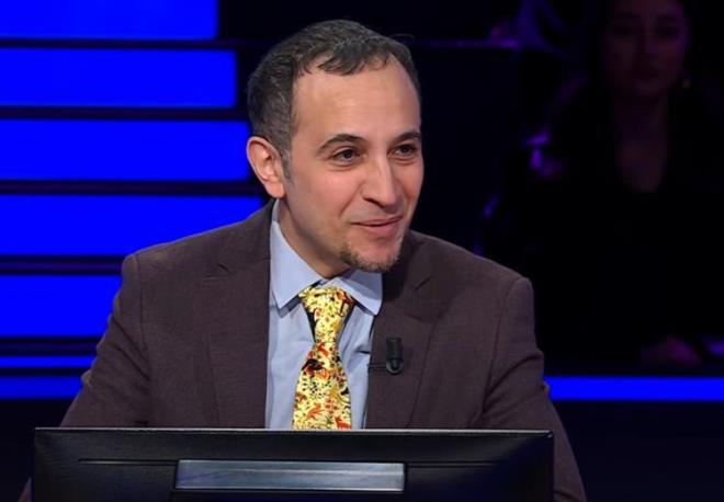 <strong>Oktay Kaynarca'n�n sunumuyla ekranlara gelen fenomen bilgi yar��mas� Kim Milyoner Olmak �ster, yay�nlanan son b�l�m�nde yar��mac� Ferhat Buran izleyenlere adeta seyir keyfi ya�att�.</strong>