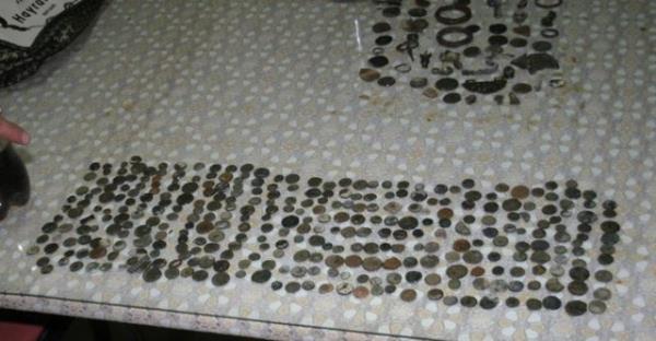 Konya'da bir otomobilde yaplan aramada kola ielerinin ierisine konulmu 730 para tarihi eser ele geirildi