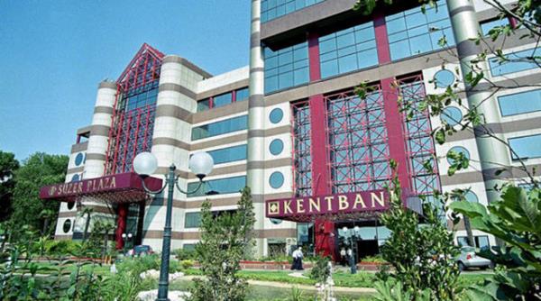 9 Temmuz 2001'de Szer Grubu'na dorudan kullandrlan krediler, karlkl krediler, Dolmabahe Turizm'in sat yoluyla Szer Grubu'na kaynak aktarm, banka kaynann israf edilmesi gibi gerekeler gsterilerek Kentbank'a el kondu.