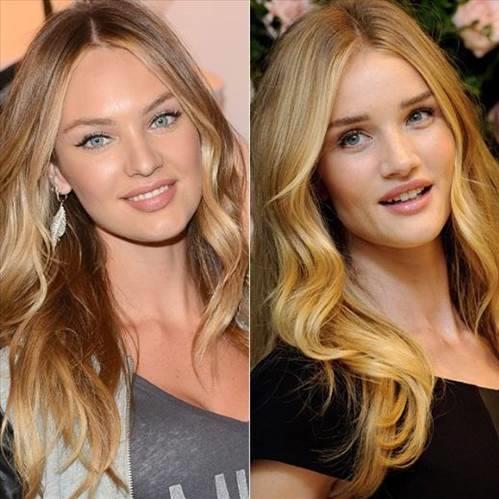 Rosie Huntington-Whiteley ve Candice Swanepoel'i bir ok kii kartryor.