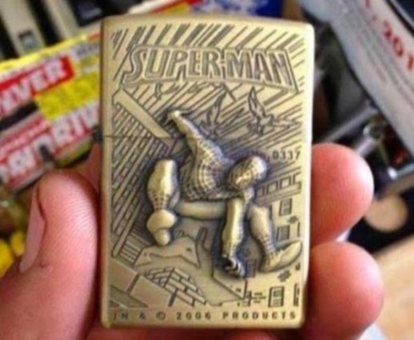 rmcek adam tasvirli Spermen etiketli bir zippo akmak..