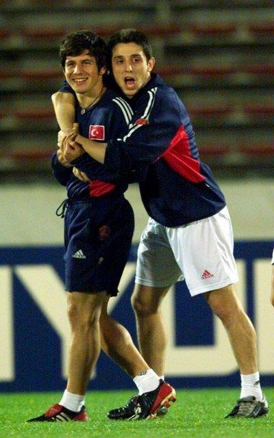 EMRE BELZOLU-NHAT KAHVEC