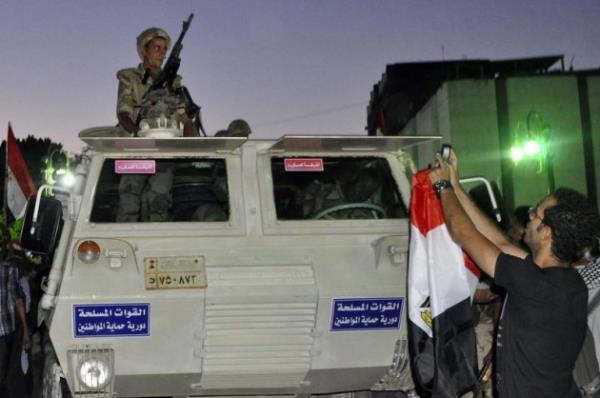 Erhan BAYURT &#8207;@erhan_basyurt 24 dk : Msr'da darbe ve batnn yaananlar karsnda ban kuma sokmas "Darbeler dnemi geride kald" diyenler iin ac bir ders niteliinde...