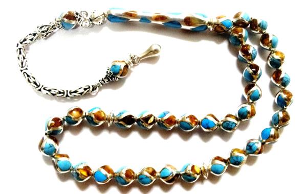 obann armaan bir bardak sttr. amn sakz da kehribar yani hediyedir. En ok kullanlan tespihlerden bir tanesidir.