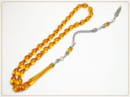 <p><b>DAMLA KEHRBAR TESPHLER</b></p>    <br>En ok revata olan tespih damla kehribar. </br>    <br>Gram baznda satlan bu damla kehribar tespihler en ok ila sanayisinde kullanlyor.</br>