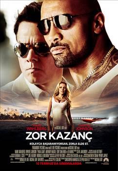 <p>ZOR KAZAN</p>    Gerek bir hikayeden uyarlanan kara komedi-aksiyon trndeki "Zor Kazan" filminde, kendi Amerikan ryalarnn peinden gitmeye karar veren arkadalarn hikayesi anlatlyor.Ynetmenliini Michael Bay'in stlendii filmin barollerinde Mark Wahlberg, Anthony Mackie ve Dwayne Johnson yer alyor.