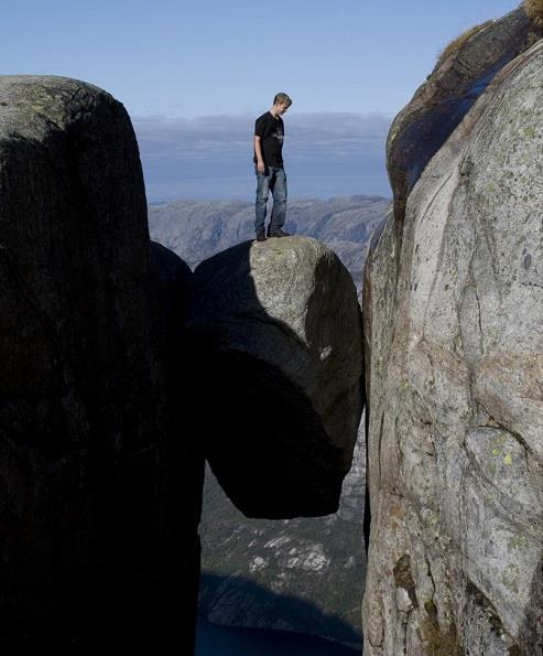 10) On the Kjeragbolten boulder in Norway.