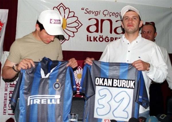 EMRE BELZOLU-OKAN BURUK