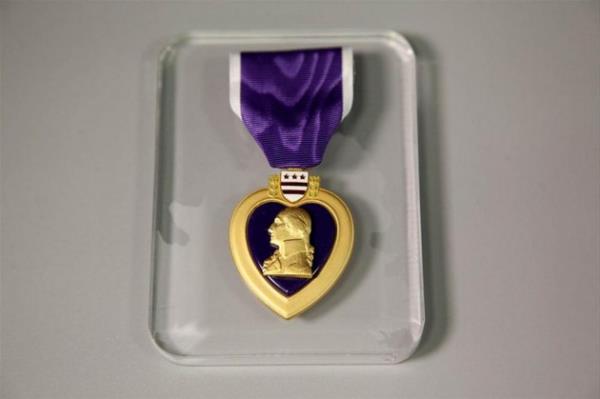 11 Eyll saldrlarnda yaralanan silahl kuvvetler mesuplarna verilen 'Purple Heart' madalyalarndan biri.