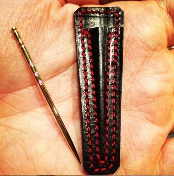 600 Dolarlk kymetli talarla ssl altn krdan ve el yapm hakiki deri ambalaj...