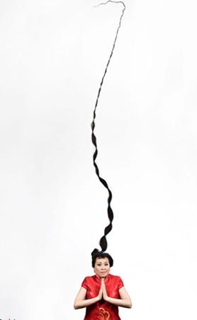 Xie Qiuping&#8217;in salar 8 Mays 2004&#8217;de lldnde Xie uzunluu 5 metre 62 cm&#8217;ydi. Qiuping o tarihten bugne dnyann en uzun sal insan nvann elinde tutuyor. Qiuping 1973 ylndan beri salarn uzatyor.